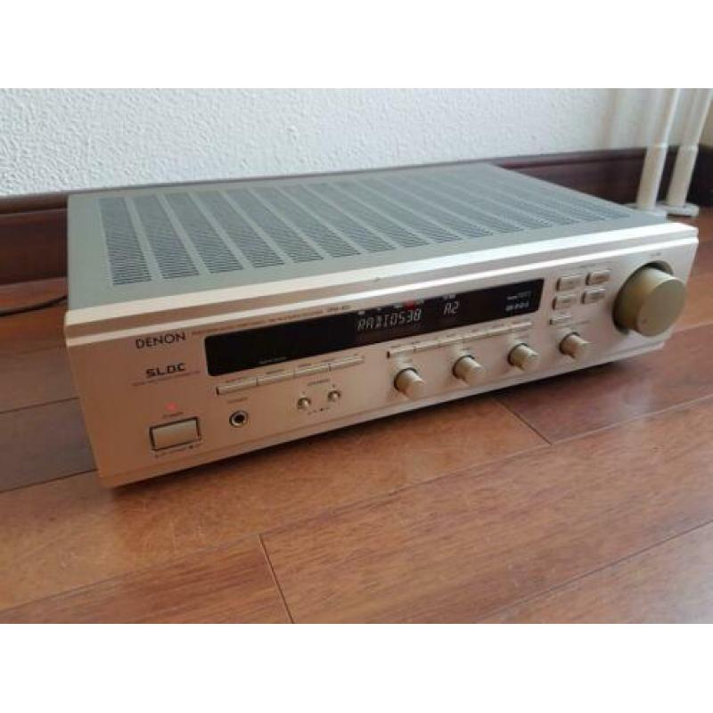 Denon DRA-455 stereo receiver.