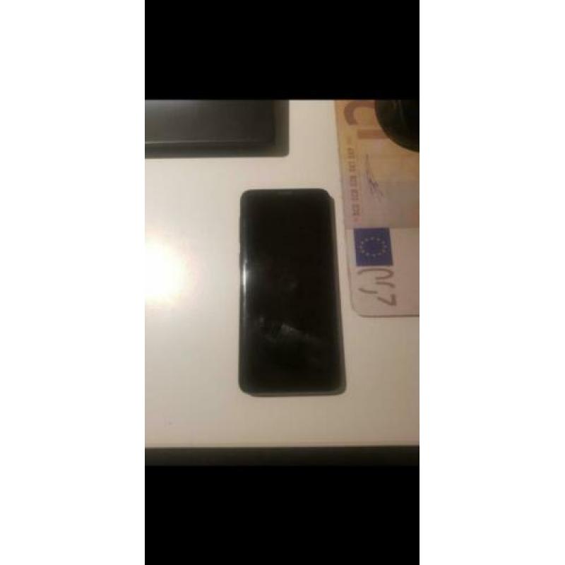 Samsung S9, achterkant beschadigt. Inc. Lader en Verpakking