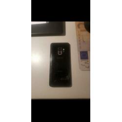 Samsung S9, achterkant beschadigt. Inc. Lader en Verpakking