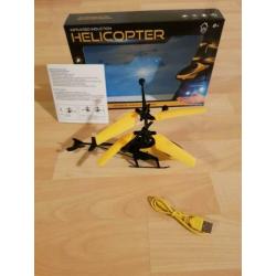 Bestuur de helikopter met je hand.