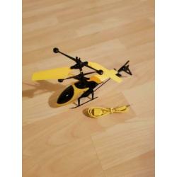 Bestuur de helikopter met je hand.