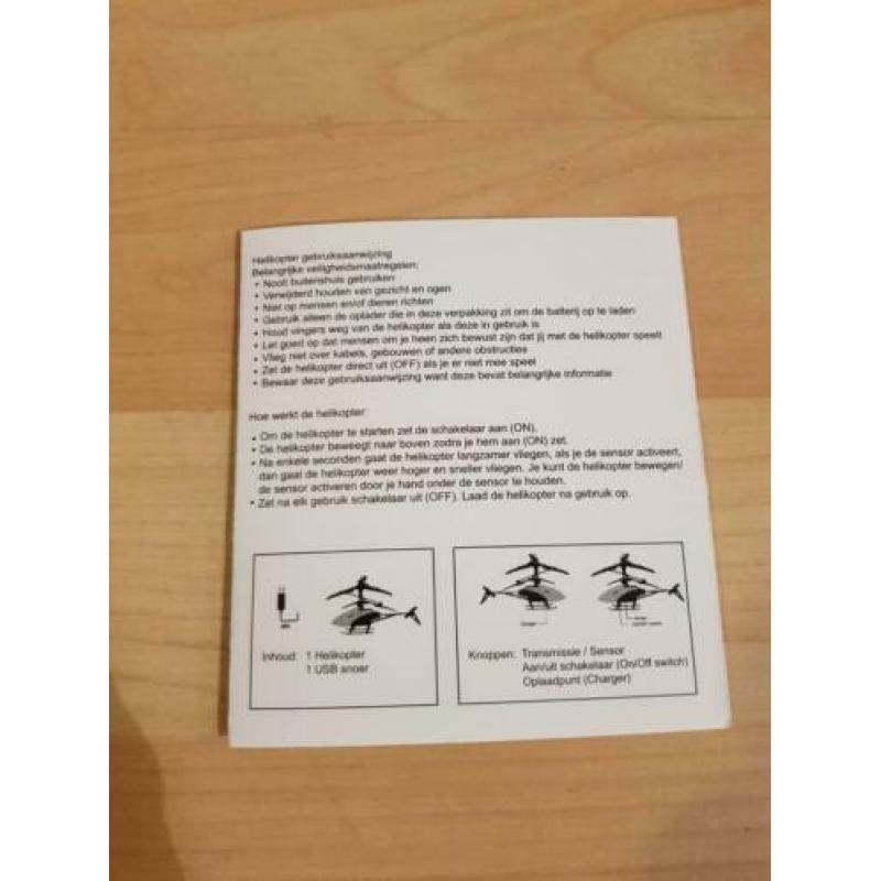 Bestuur de helikopter met je hand.
