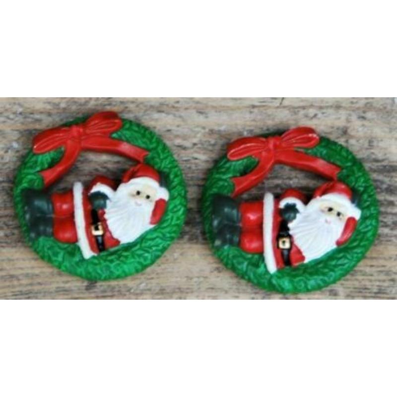Twee magneetjes met kerstman