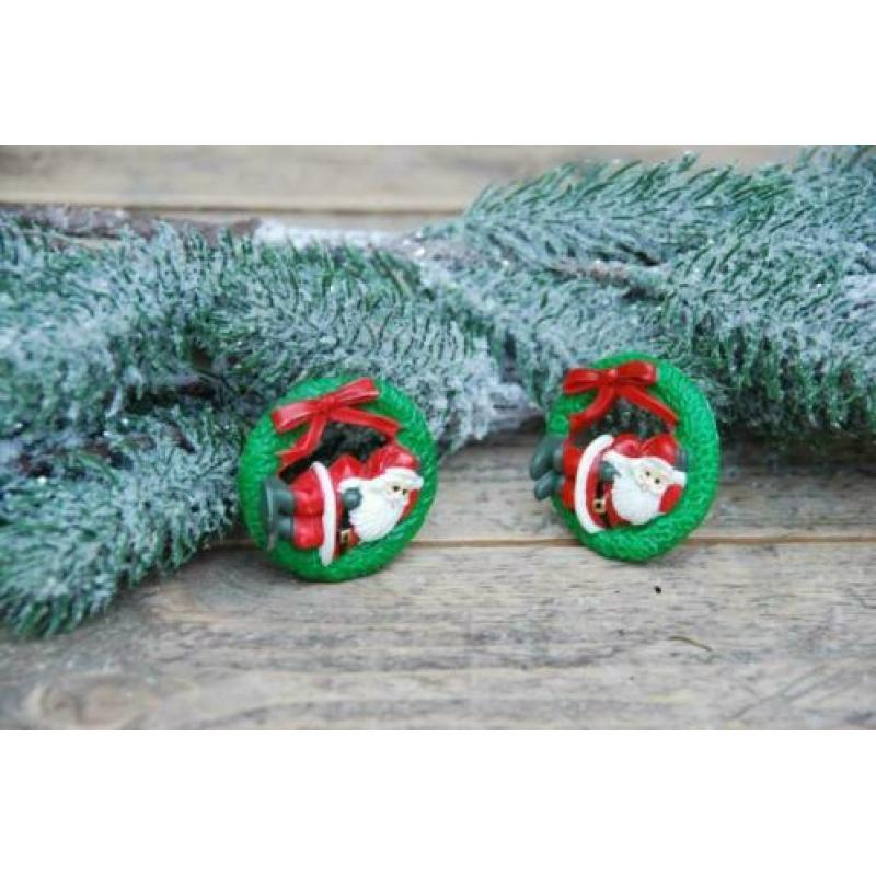 Twee magneetjes met kerstman