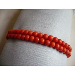 Schitterende bloedkoraal armband met gouden slot.