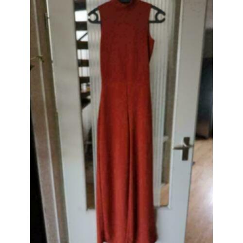 Mooie roestbruine jumpsuit met open rug em flared pijp mt 38