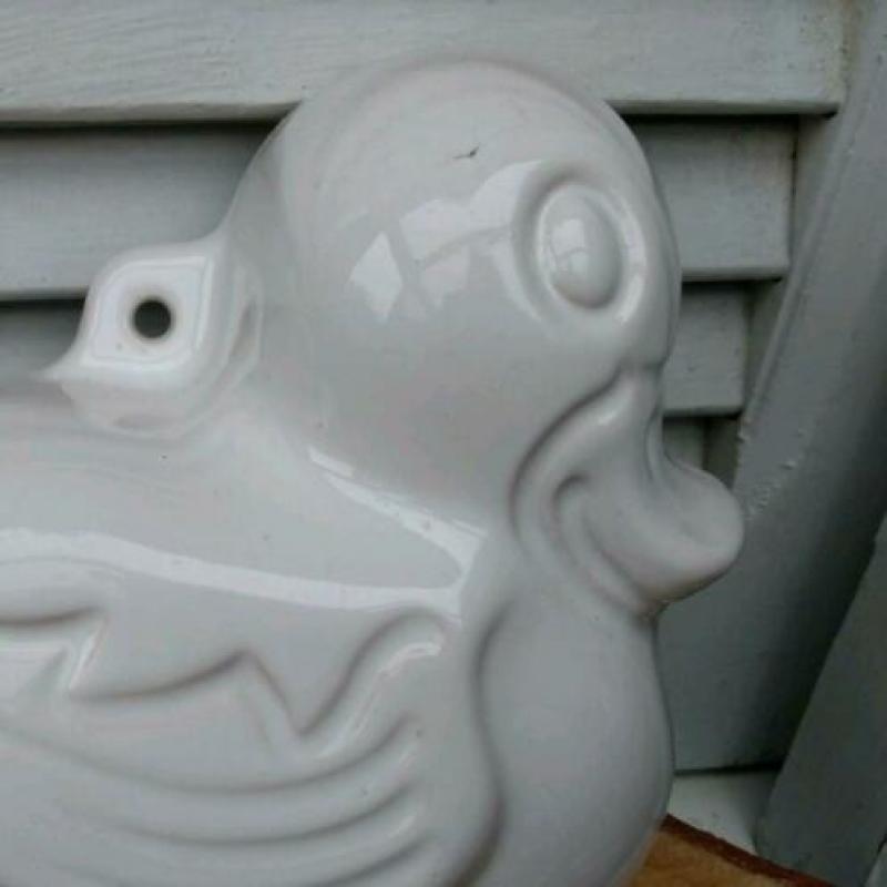 Oude puddingvorm eend en bakblikje koe