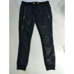 Leuke lederlook jogging model broek met stof mt M nieuw