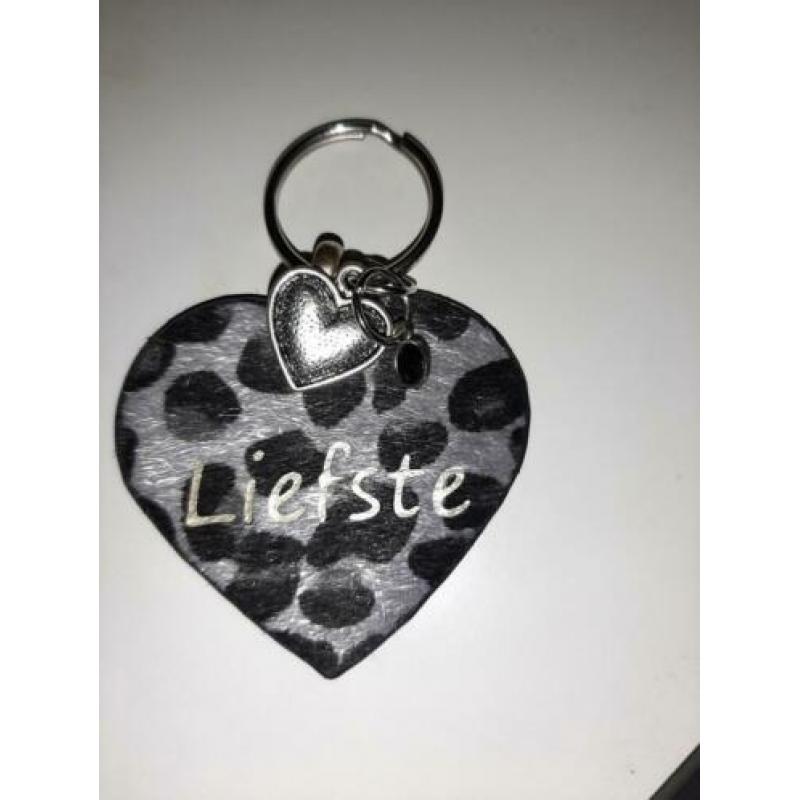 Sleutel / tassen hanger in hart of ster vorm