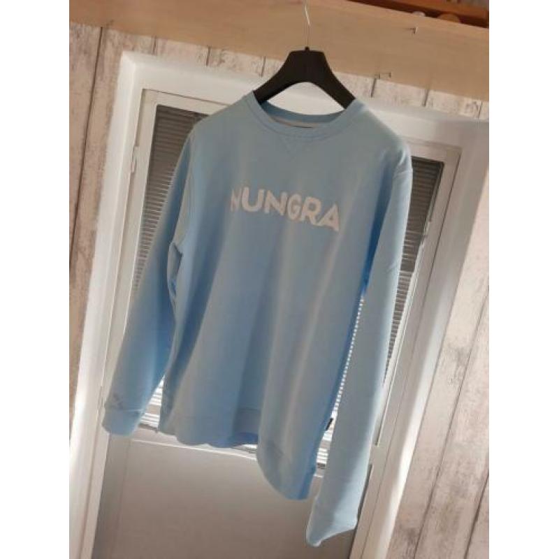 Mungra sweaters.