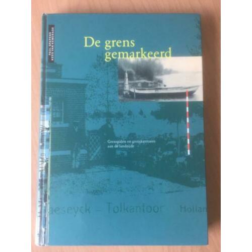 de grens gemarkeerd grenspalen en grenskantoren fraai boek