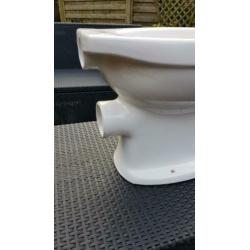 Toiletpot met ACHTER uitlaat