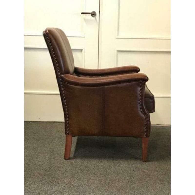 Engelse fauteuil in rundleer van Jeantique