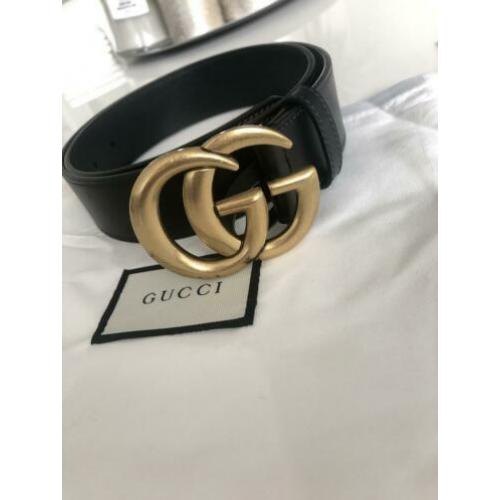 Gucci riem, bon aanwezig