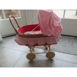 Rieten poppenwagen zgan.