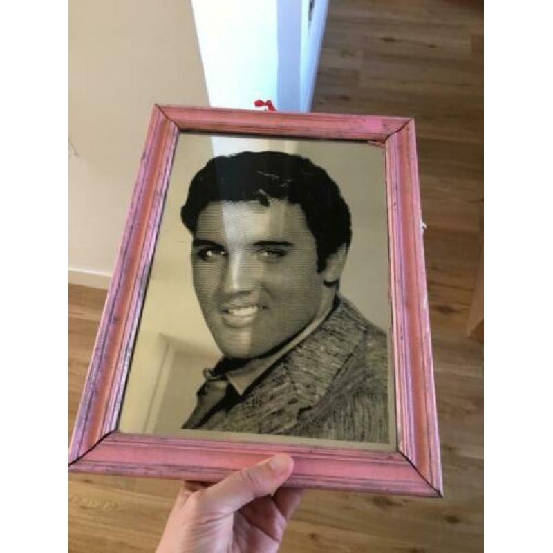 Spiegel Elvis en John Travolta