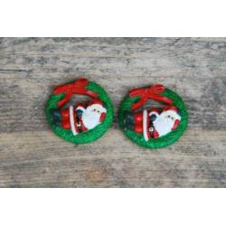 Twee magneetjes met kerstman