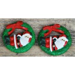 Twee magneetjes met kerstman