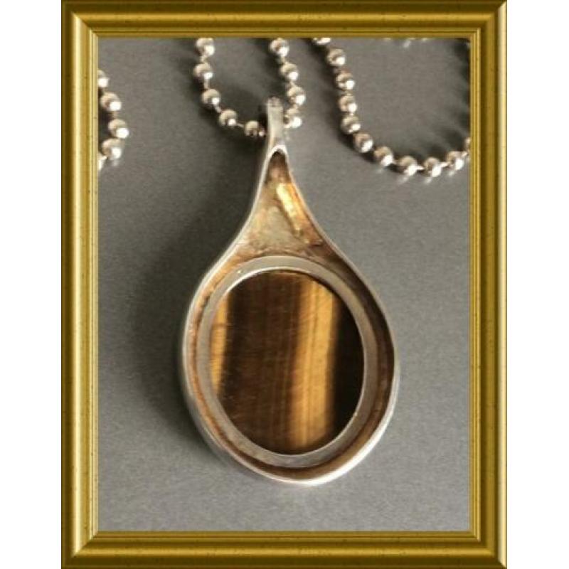 Mooie grote zilveren hanger aan ketting: tijgeroog