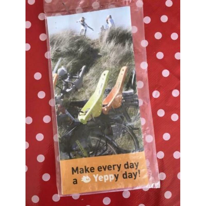 Kinder fietszitje van Yepp voor achterop.