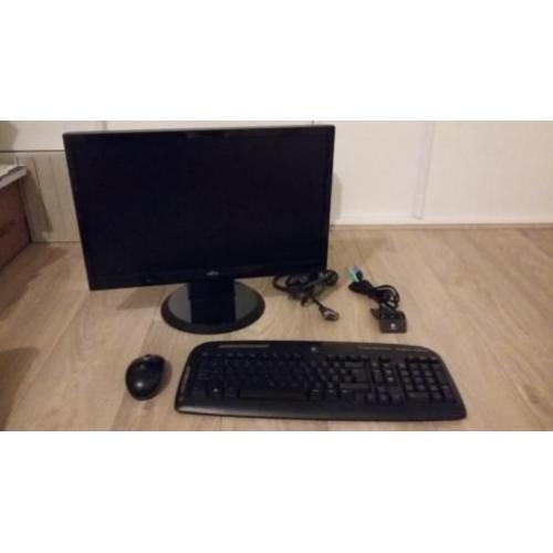 Beeldscherm met draadloze muis en toetsenbord