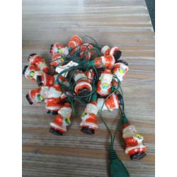 Leuke oude kerstverlichting kerstmannetjes