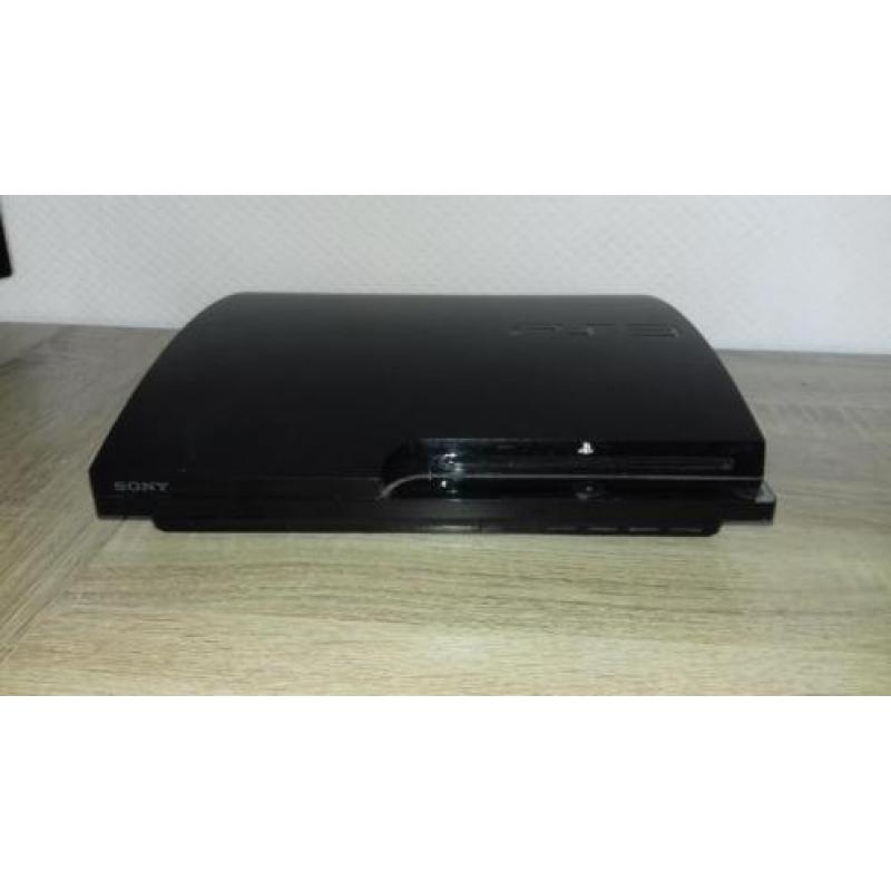 Playstation 3 + 7 spellen en 2 controllers