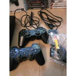 PS3 Slim 160 GB + 24 games + 2 controllers