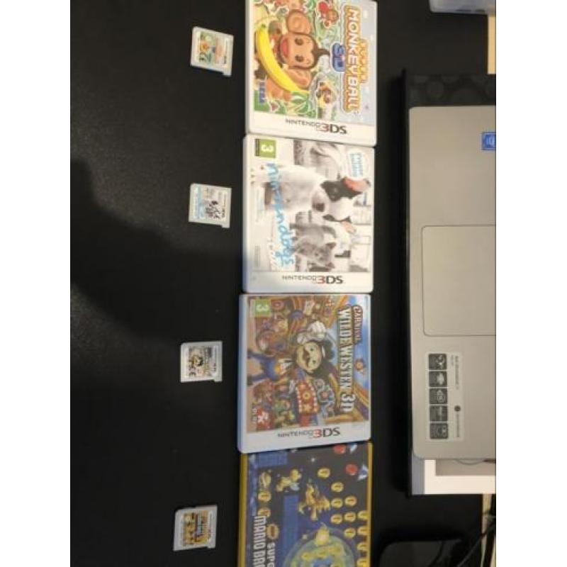 Aqua blauwe 3ds met spellen en toebehoren